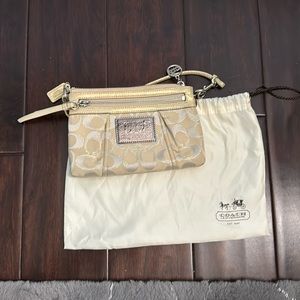 Coach, gold and silver small purse never used
